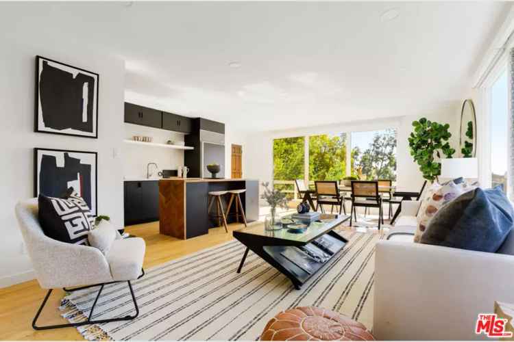 Luxury Hillside Home with City Views and Multipurpose Space