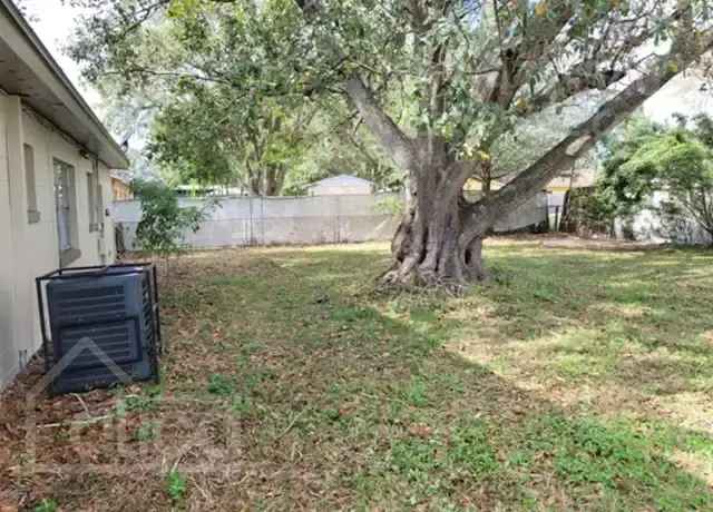 Remodeled 3 Bedroom Home in Orlando with Carport and Fenced Yard