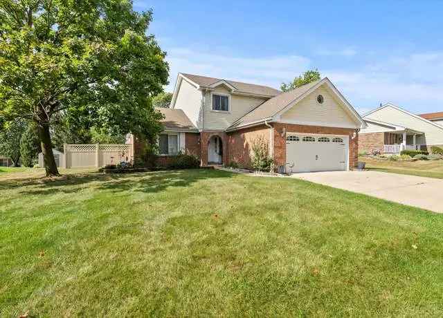 Stunning 4-Bedroom Home with Main-Level Bedroom and Pond Views