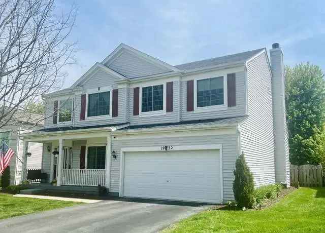 4-Bedroom 2-Story Home with Large Porch and Updated Kitchen