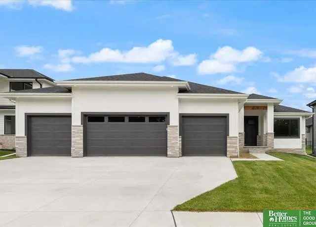 Showcase Home 4 Car Garage Split Bedroom Plan