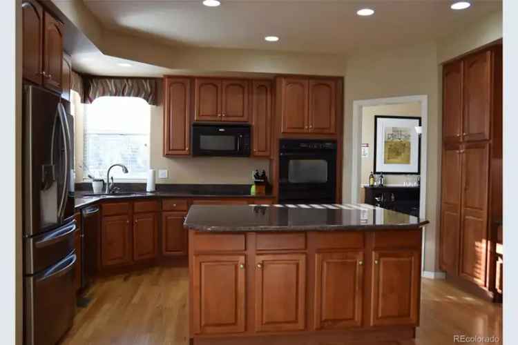 5-Bed 5-Bath Home in The Farm with Western Views and Finished Basement