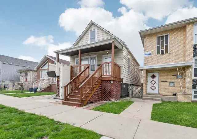 Charming Fixer-Upper with Expansion Potential in Archer Heights