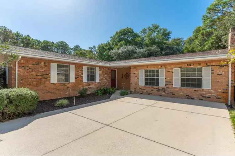 Niceville Brick Home with Pool and Recent Upgrades
