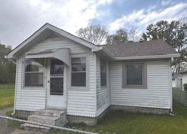 Charming 3-Bedroom House with 2 Garages and Fenced Yard