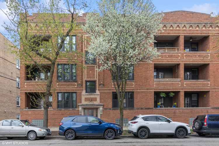 Sun Drenched 2-Bedroom Condo with Exposed Brick and Private Outdoor Spaces