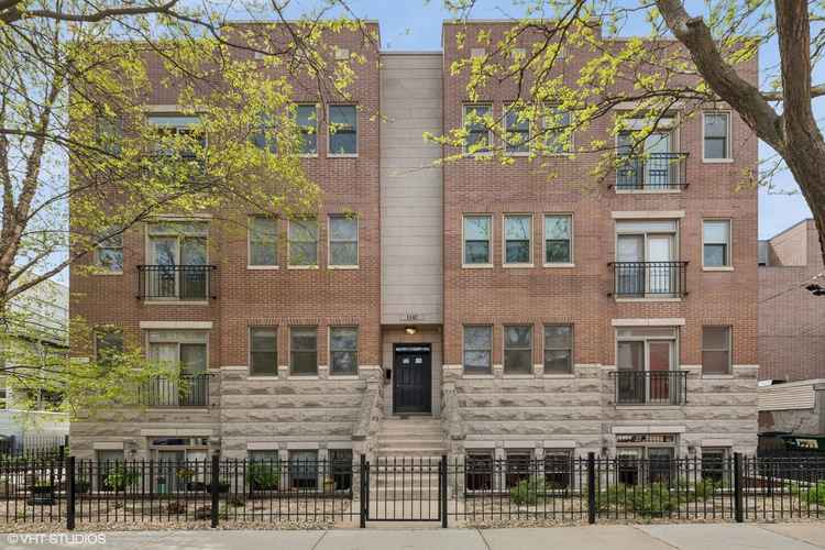 Wicker Park West Town Updated Corner Unit with Terrace and Garage Parking