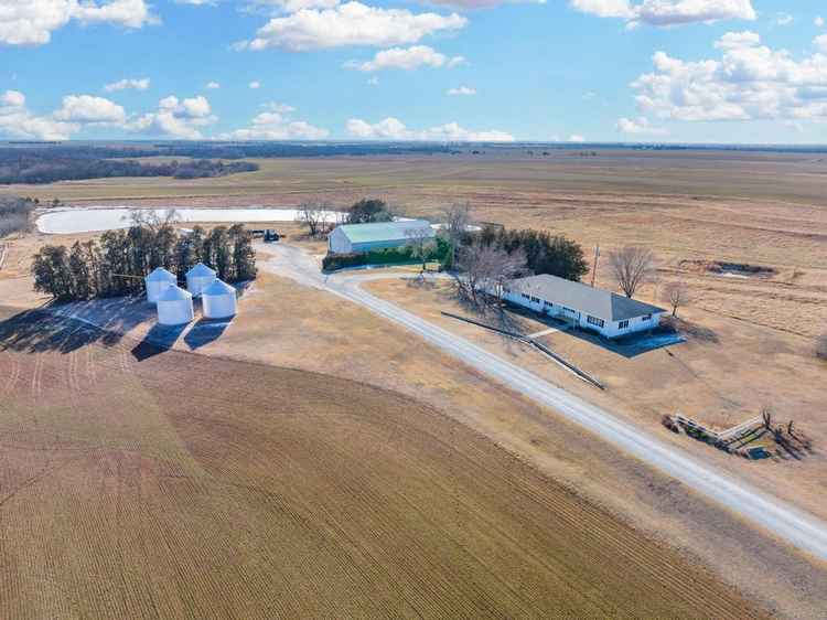 Lake House on 50 Acres with Pond Creek Outbuildings